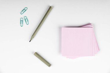 Notebook and Colored Papers Stickers Lying On Desk. Collection Stationery.