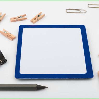 Important Messages. Sticker Lying On White Desk With Clotherspins.