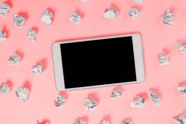 Important Message Presented On Phone On Desk With Paperwraps, Paper.