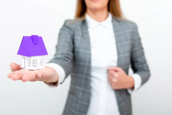 Businesswoman Gray Suit Holding Colored Paper House One Hand — Fotografia de Stock