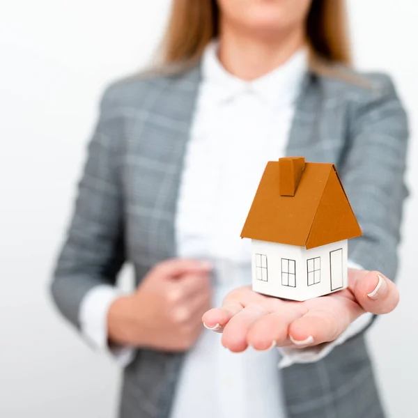 Businesswoman Gray Suit Holding Colored Paper House One Hand — Fotografia de Stock