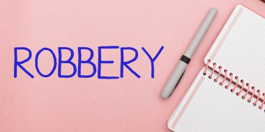 Sign displaying Robbery, Word Written on the action of taking property unlawfully from a person or place by force or threat of force