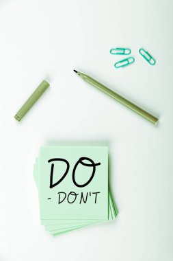 Conceptual caption Do DonT, Conceptual photo rules and laws on how humans can or cant and should not