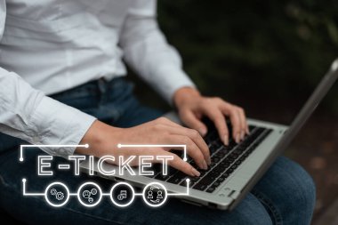 Conceptual caption E Ticket, Business overview flight booking for which the details are registered electronically