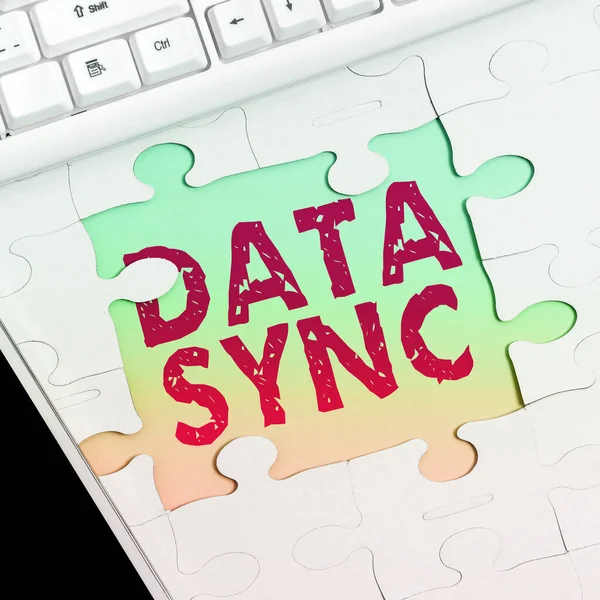 Sign displaying Data Sync, Business overview data that is continuously generated by different sources