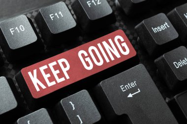 Text sign showing Keep Going, Business idea make an effort to live normally when in a difficult situation