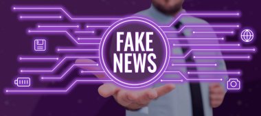 Conceptual caption Fake News, Conceptual photo Giving information to people that is not true by the media