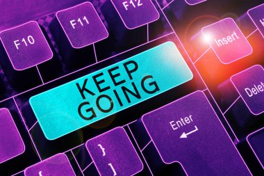 Text showing inspiration Keep Going, Concept meaning make an effort to live normally when in a difficult situation