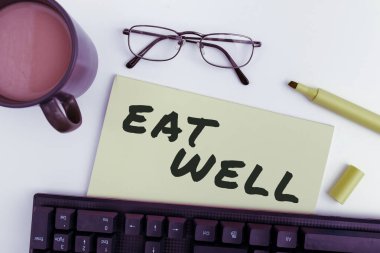 Writing displaying text Eat Well, Business showcase Practice of eating only foods that are whole and not processed