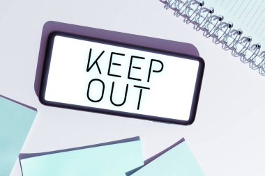 Text sign showing Keep Out, Business idea to stop someone or something from going into a place Danger sign