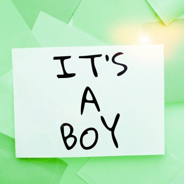 Conceptual caption Its A Boy, Business idea Expecting a male baby cute blue colors a lot of car toys