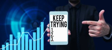 Text sign showing Keep Trying, Concept meaning continue to do something or to do something again and again