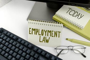 İş hukuku, iş fikri, işveren ve çalışanların yasal hakları ve görevleriyle ilgili el yazısı imzası.