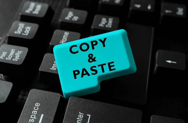 Sign displaying Copy Paste, Concept meaning an imitation, transcript, or reproduction of an original work