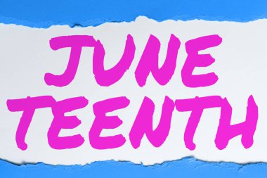 Amerika Birleşik Devletleri 'nde köleliğin sona ermesinin anısına Amerika' da İş Fikri Resmi Tatili 'ni sunan metin başlığı