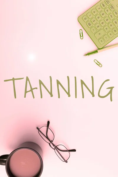Handwriting text Tanning, Business overview a natural darkening of the scin tissues after exposure to the sun