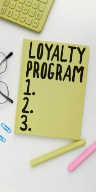 Writing displaying text Loyalty Program, Word for marketing effort that provide incentives to repeat customers