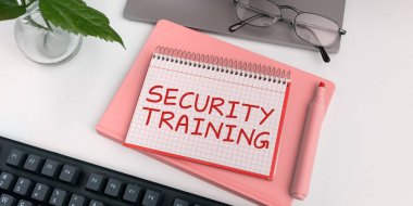 Hand writing sign Security Training, Business concept providing security awareness training for end users