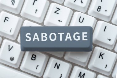 Sabotaj, iş görüşmeleri, işverenlerin araç ve malzemelerinin işçiler tarafından tahrip edilmesini gösteren metin işareti