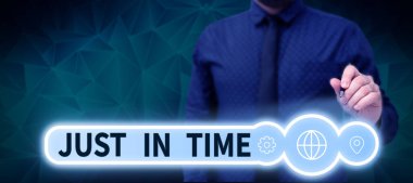 Conceptual caption Just In Time, Word Written on Arriving exactly at hour required Punctuality Responsibility