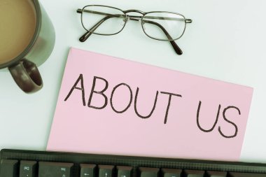 Text showing inspiration About Us, Concept meaning to introduce who or what something relates to or concerns