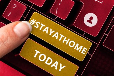 Conceptual display Stayathome, Business idea a trending label in social media related to the coronvirus outbreak