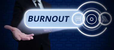 Hand writing sign Burnout, Business overview Feeling of physical and emotional exhaustion Chronic fatigue
