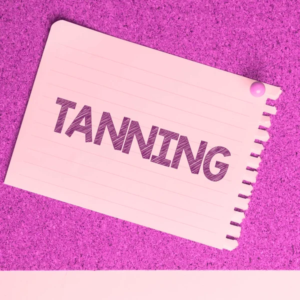 Text sign showing Tanning, Business overview a natural darkening of the scin tissues after exposure to the sun