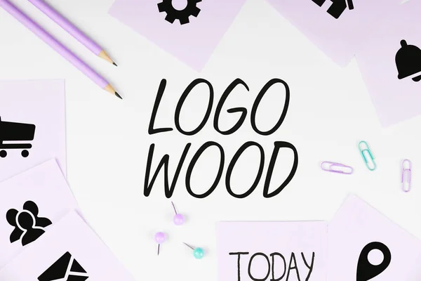 Hand writing sign Logo Wood, Business showcase Recognizable design or symbol of a company inscribed on wood