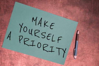 Conceptual caption Make Yourself A Priority, Business idea Think in your own good first personal development