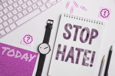 Writing displaying text Stop Hate, Business concept Prevent the aggressive pressure or intimidation to others