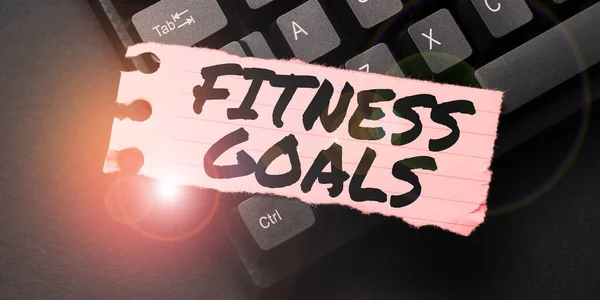 Handwriting text Fitness Goals, Concept meaning Loose fat Build muscle Getting stronger Conditioning