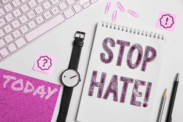 Writing displaying text Stop Hate, Business concept Prevent the aggressive pressure or intimidation to others