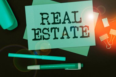 Conceptual caption Real Estate, Word for the property consisting of land and the buildings on it