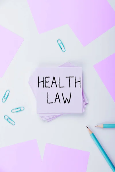 Text showing inspiration Health Law, Concept meaning law to provide legal guidelines for the provision of healthcare