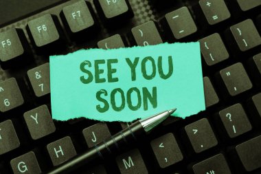 Birisine veda etmek ve yakında tekrar buluşmak için kullanılan kavramsal fotoğraf, See You Soon 'u sunan metin başlığı