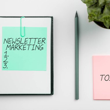 Hand writing sign Newsletter Marketing, Conceptual photo act of sending a commercial messages to customer clipart