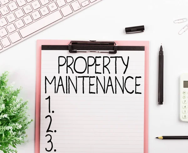 Sign displaying Property Maintenance, Business approach refers to overall upkeep of real property or land