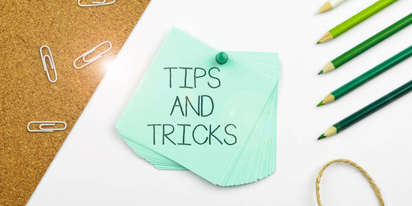 Text caption presenting Tips And Tricks, Word Written on helpful advices that makes certain action easier to do