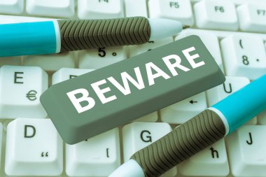 Sign displaying Beware, Business idea used to warn someone to be very careful about something or someone