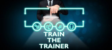 Sign displaying Train The Trainer, Business concept identified to teach mentor or train others attend class