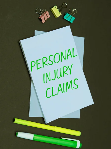 Writing displaying text Personal Injury Claims, Word Written on being hurt or injured inside work environment