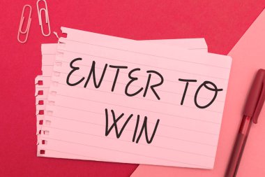 Hand writing sign Enter To Win, Word for exchanging something value for prize or chance of winning