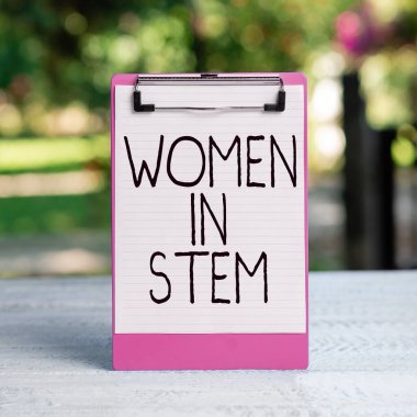 Hand writing sign Women In Stem, Concept meaning Science Technology Engineering Mathematics Scientist Research