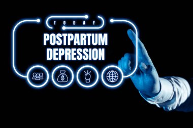 Hand writing sign Postpartum Depression, Word Written on a mood disorder involving intense depression after giving birth