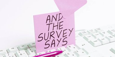 Text caption presenting And The Survey Says, Conceptual photo doing poll and bring the results discuss with others