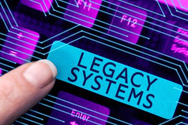 Text sign showing Legacy Systems, Word Written on old method technology computer system or application program