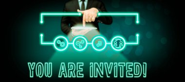 Hand writing sign You Are Invited, Business approach Receiving and invitation for an event Join us to celebrate