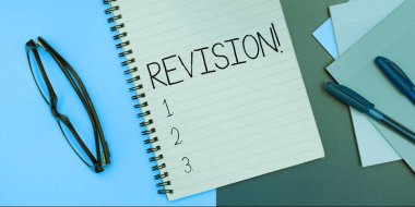 Writing displaying text Revision, Business concept action of revising over someone like auditing or accounting