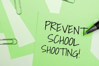 Sign displaying Prevent School Shooting, Business idea actions committed to terminate use of firearms in educational facilities